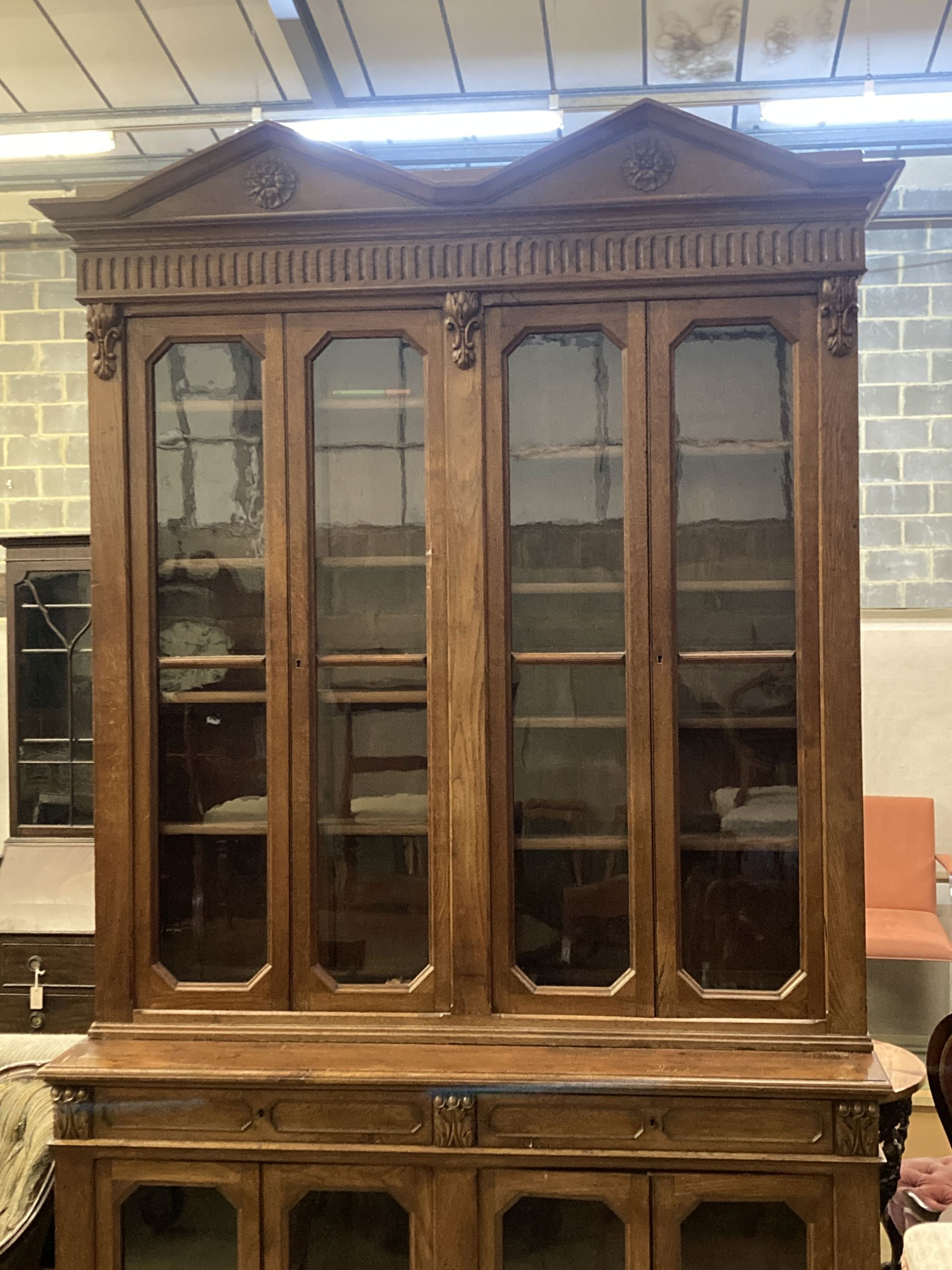 A Victorian oak library bookcase, length 160cm, depth 54cm, height 280cm